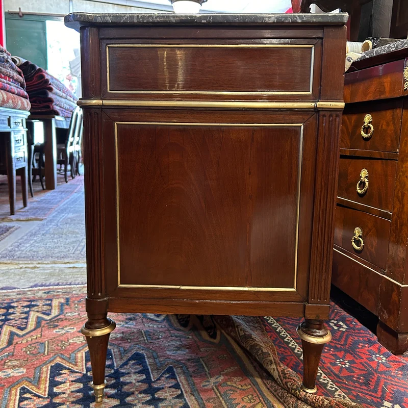 Mahogany chest of drawers with marble top in late Louis XVI style