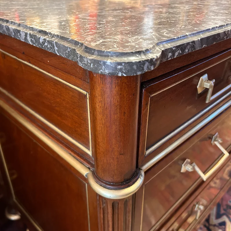 Mahogany chest of drawers with marble top in late Louis XVI style
