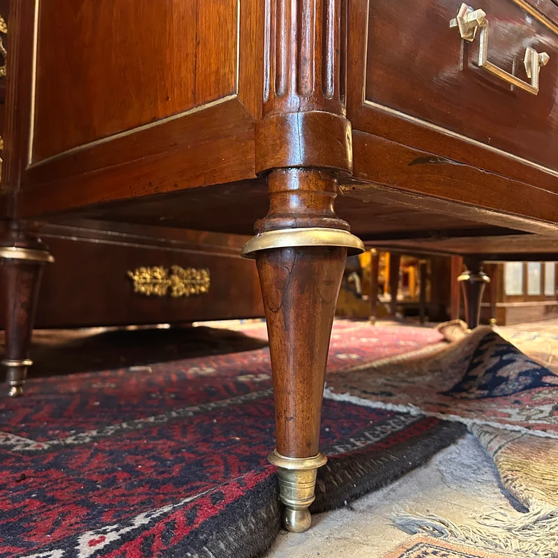 Mahogany chest of drawers with marble top in late Louis XVI style