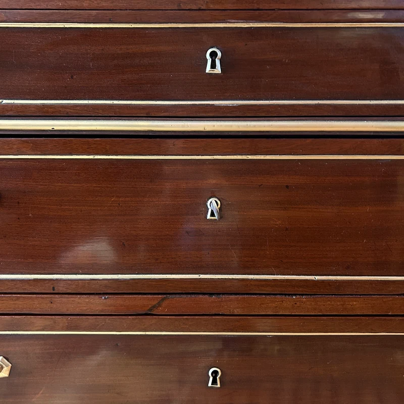 Mahogany chest of drawers with marble top in late Louis XVI style