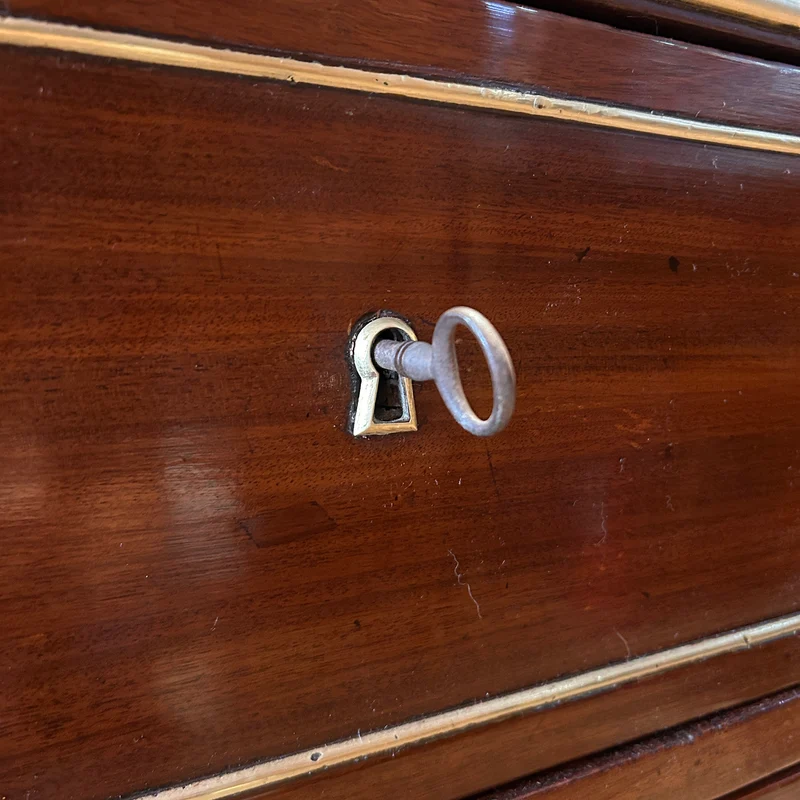 Mahogany chest of drawers with marble top in late Louis XVI style