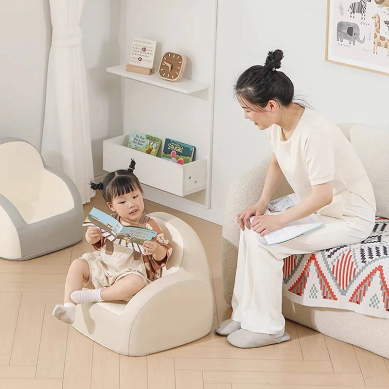 Contemporary Nordic PU Leather Sponge Arc Lightweight Kids Accent Chair Backrest Armrest For Living Room