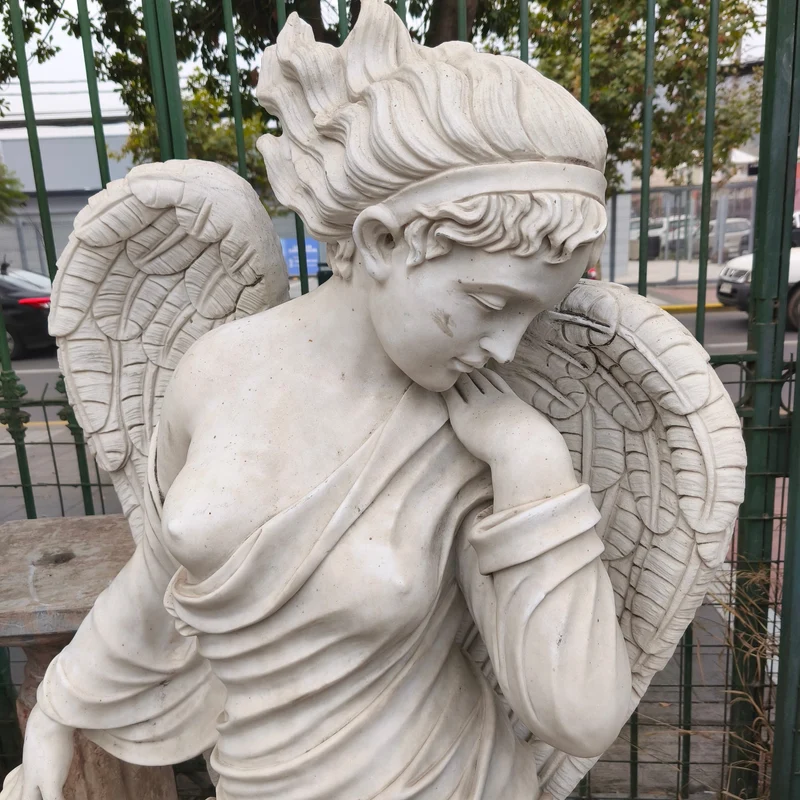 Angel of the Four Seasons - Winter sculpture in carved marble stone