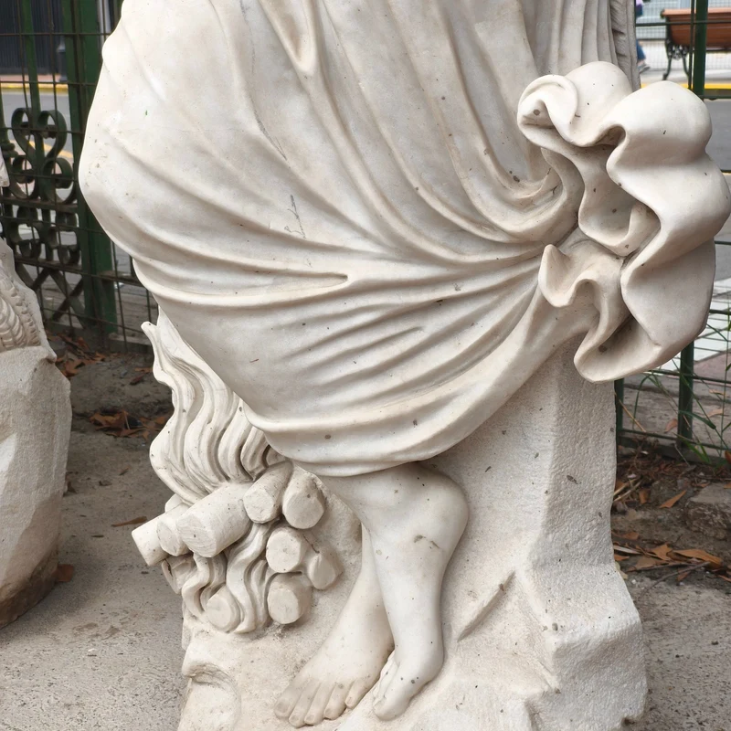 Angel of the Four Seasons - Winter sculpture in carved marble stone