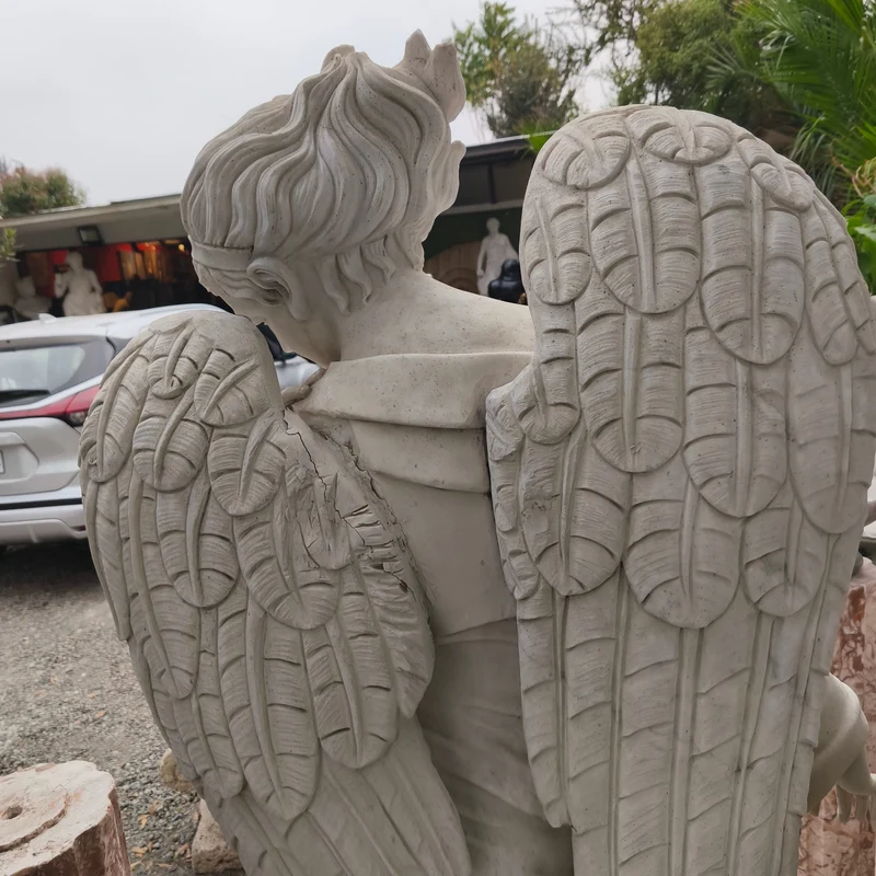 Angel of the Four Seasons - Winter sculpture in carved marble stone