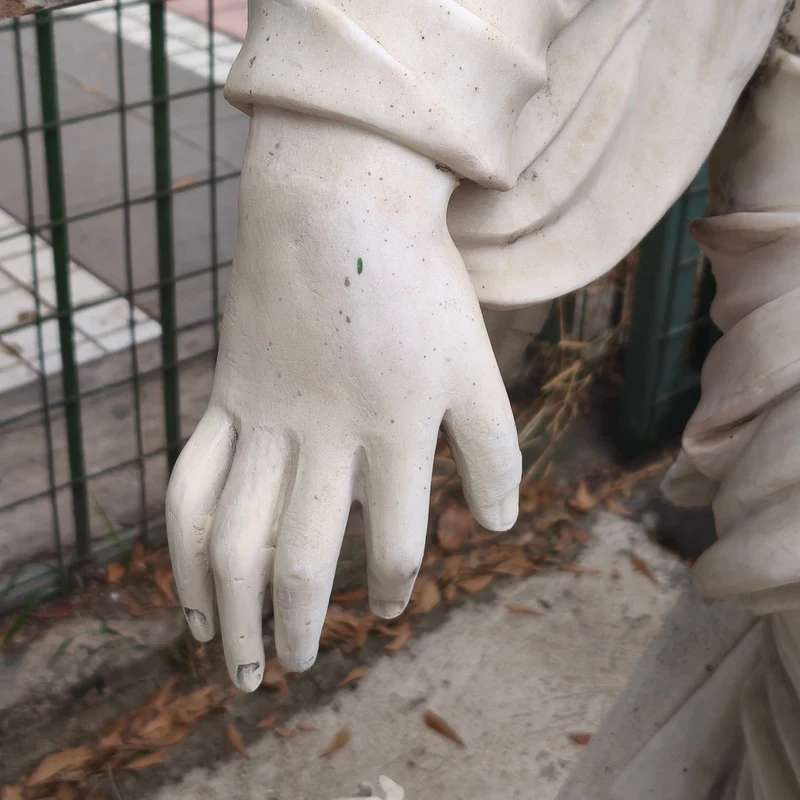 Angel of the Four Seasons - Winter sculpture in carved marble stone