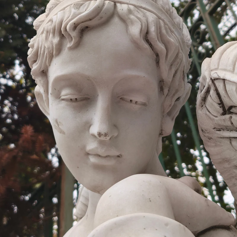 Angel of the Four Seasons - Winter sculpture in carved marble stone