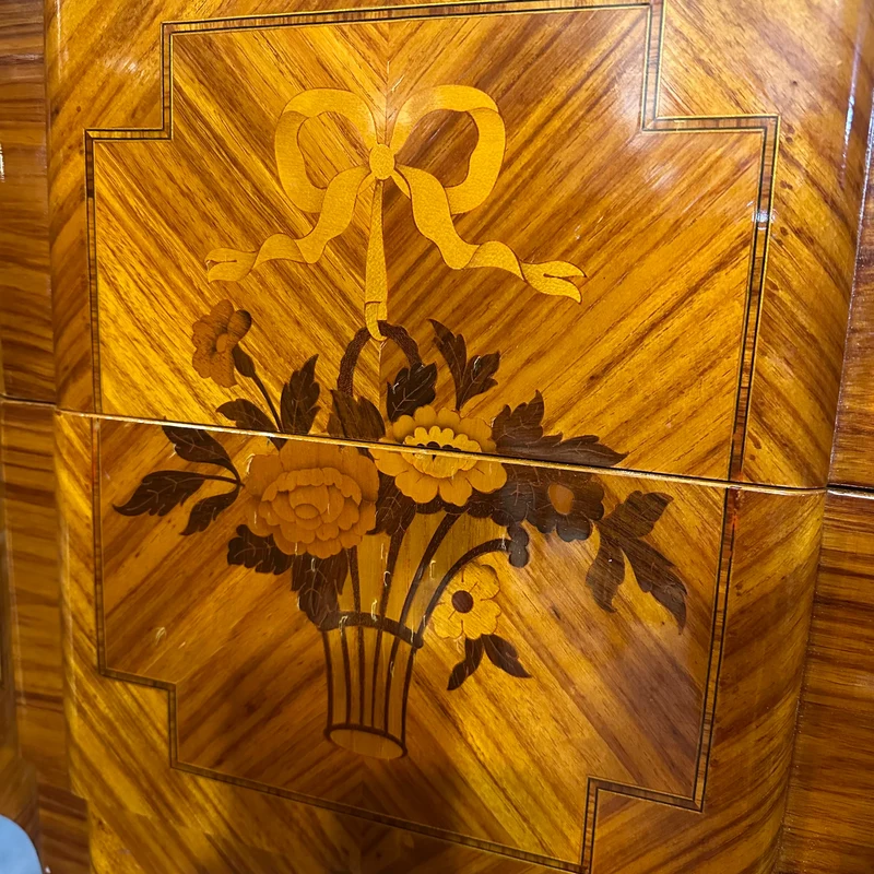 Contemporary French Transitional style small chest of drawers with bronze marquetry and marble top
