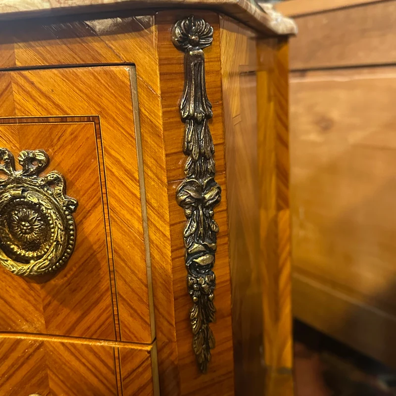 Contemporary French Transitional style small chest of drawers with bronze marquetry and marble top