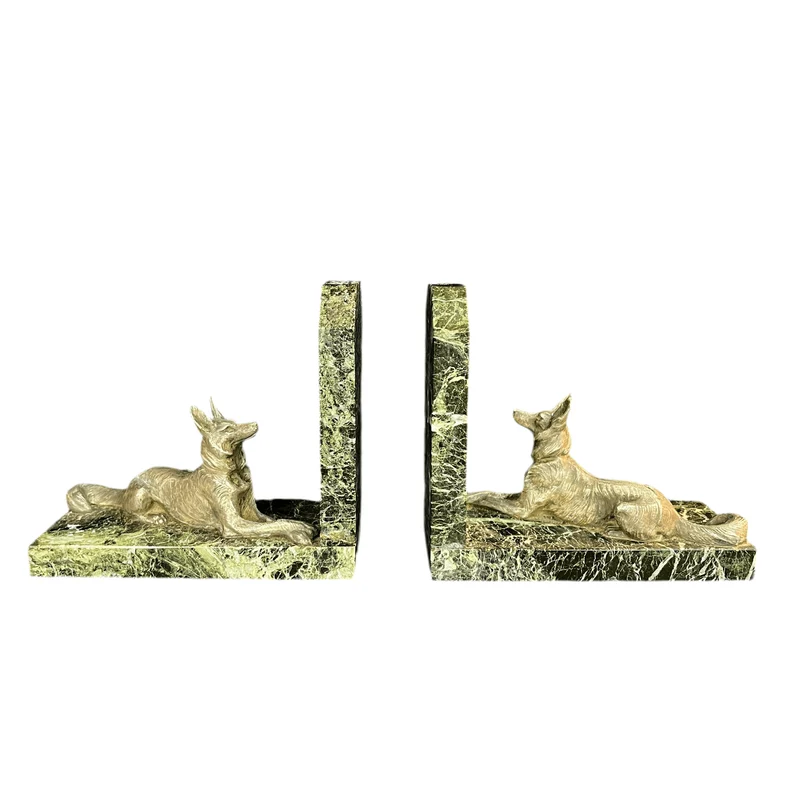 Pair of marble bookends and metal dogs