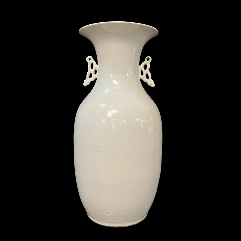 Blanc de Chine porcelain vase with openwork handles
