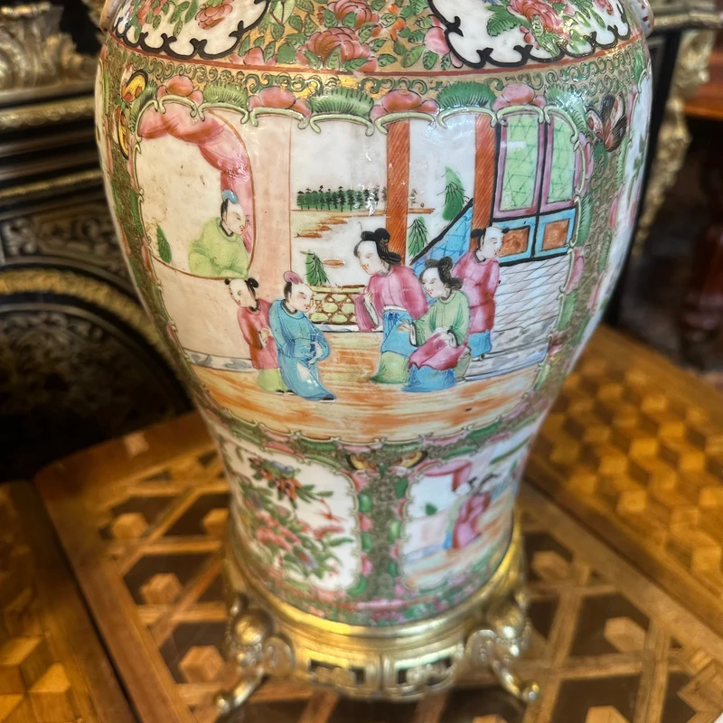 Chinese Famille Rose vase in glazed porcelain with court scenes, bronze base, 19th century