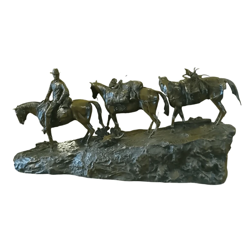 Bronze sculpture by R. Clark 'Cowboy and Horses Crossing the Mountain'