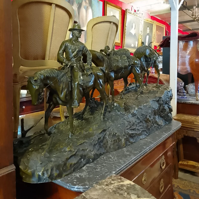 Bronze sculpture by R. Clark 'Cowboy and Horses Crossing the Mountain'