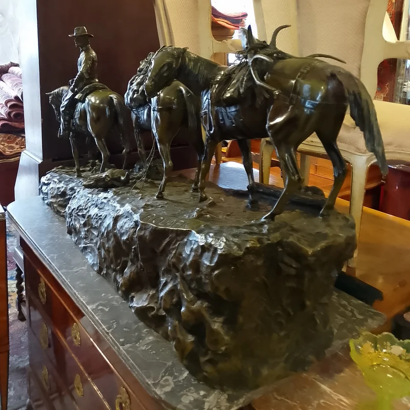 Bronze sculpture by R. Clark 'Cowboy and Horses Crossing the Mountain'