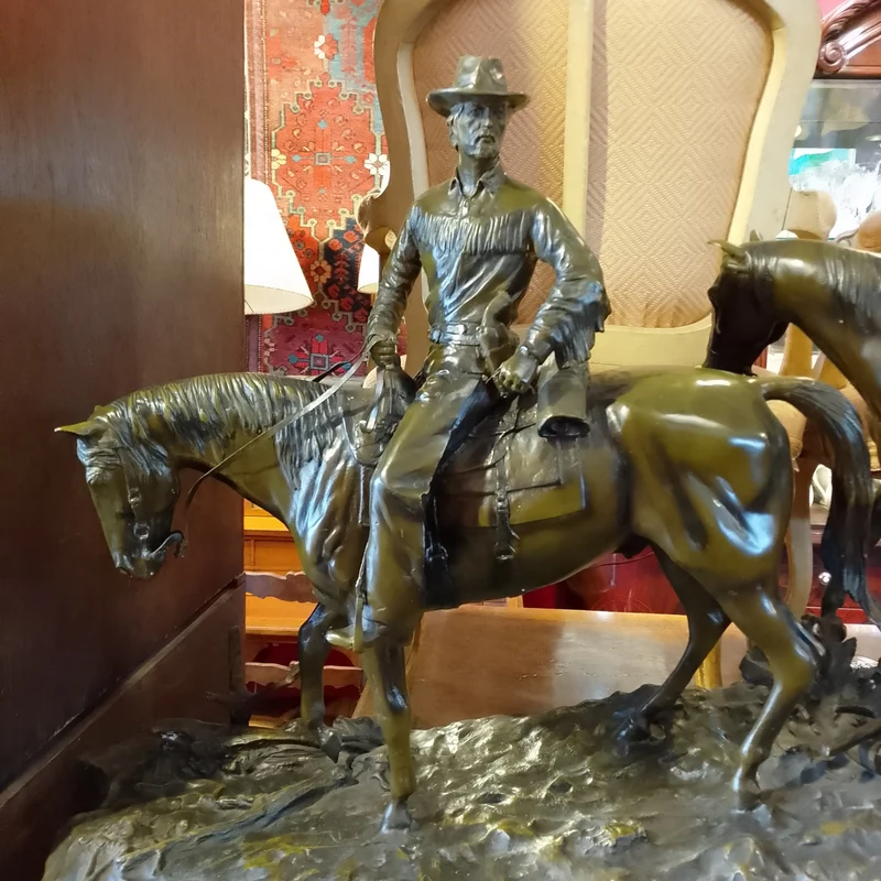 Bronze sculpture by R. Clark 'Cowboy and Horses Crossing the Mountain'