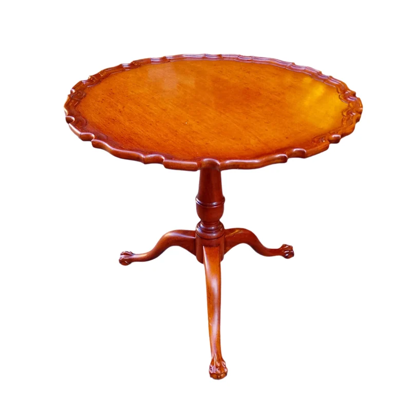 English circular table in mahogany with three lampshade legs