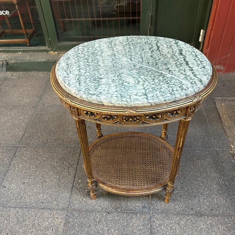 French Louis XVI side table carved in gilt reed and topped with veined green marble