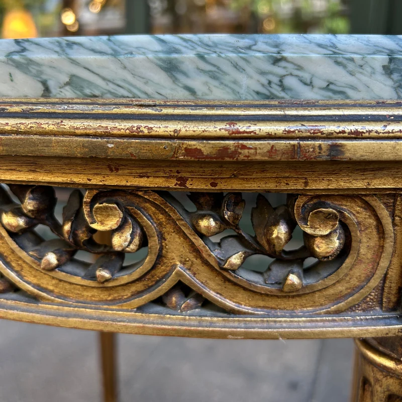 French Louis XVI side table carved in gilt reed and topped with veined green marble