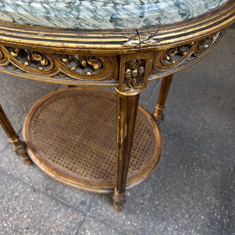 French Louis XVI side table carved in gilt reed and topped with veined green marble