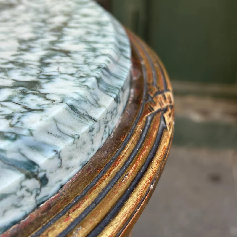 French Louis XVI side table carved in gilt reed and topped with veined green marble