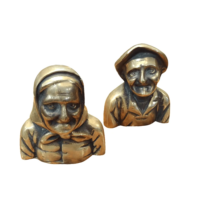 Bronze bells busts of old people