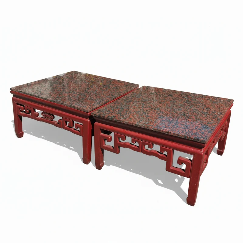 Pair of Chinese lacquered coffee tables with red granite tops