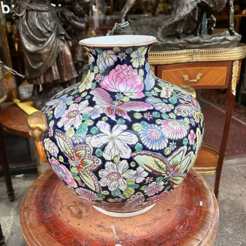 Famille Noir Chinese porcelain vase with butterflies and flowers