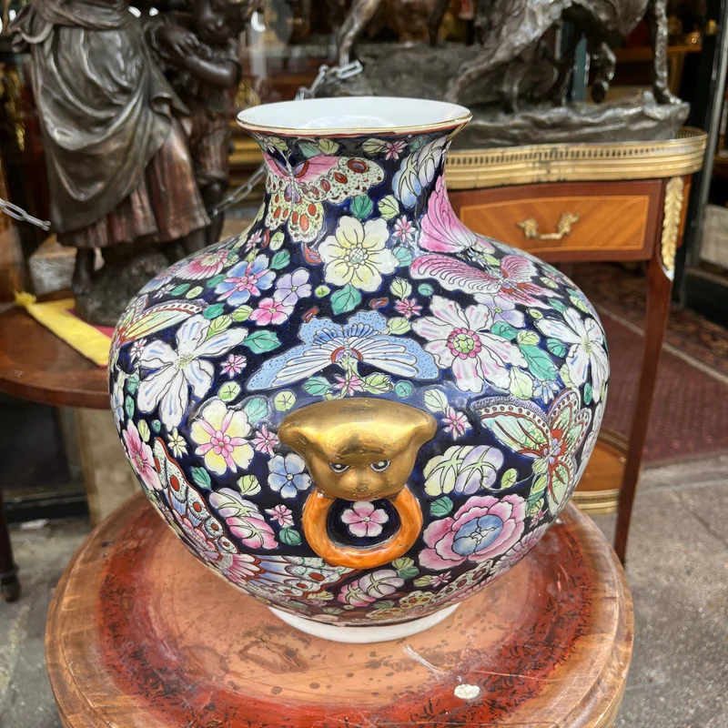 Famille Noir Chinese porcelain vase with butterflies and flowers