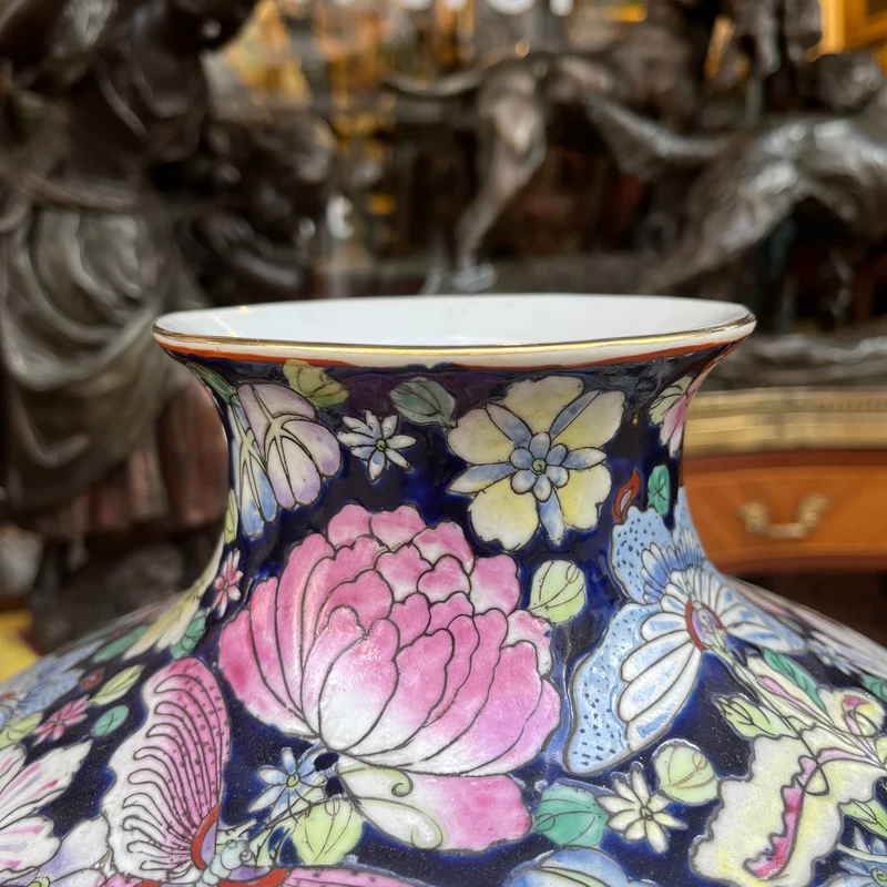 Famille Noir Chinese porcelain vase with butterflies and flowers