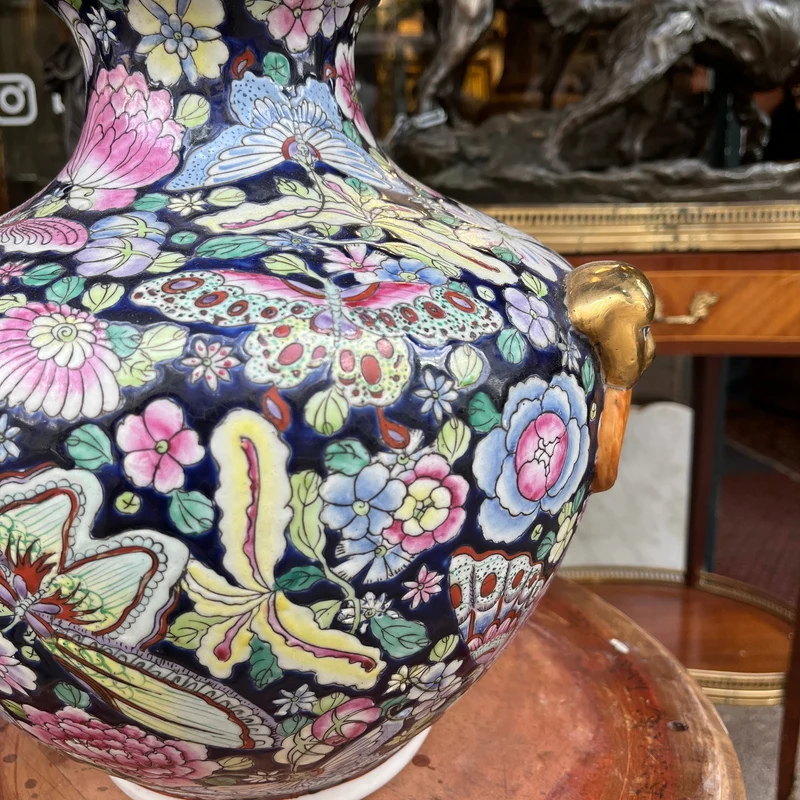 Famille Noir Chinese porcelain vase with butterflies and flowers