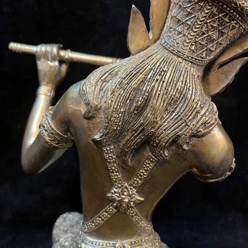 Contemporary bronze figure of a 'Hindu deity playing the flute'