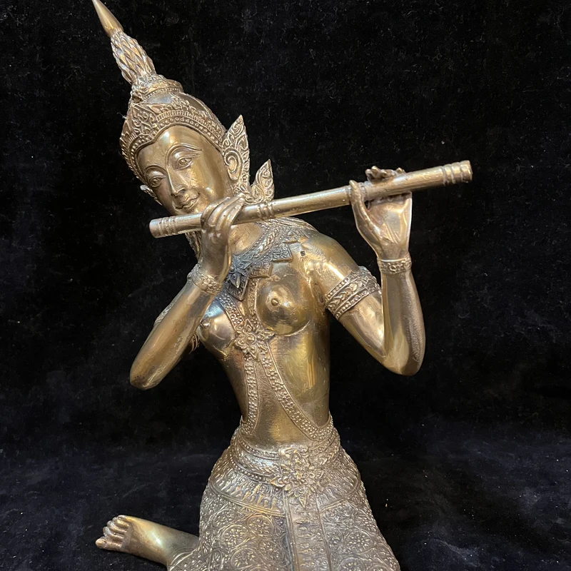 Contemporary bronze figure of a 'Hindu deity playing the flute'