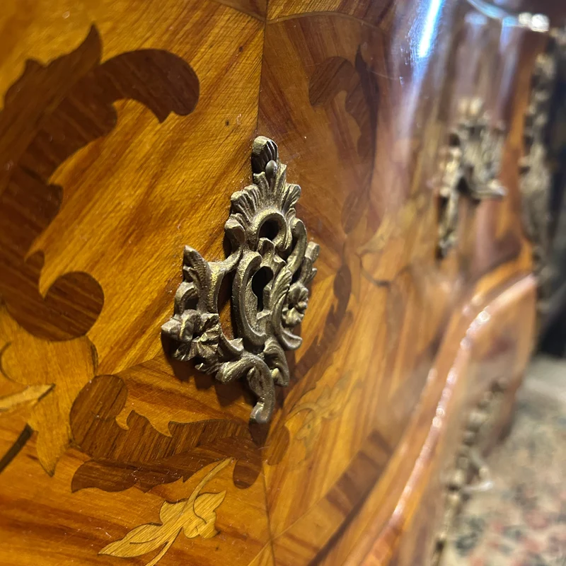 Louis XV style chest of drawers in orange-toned marble with marquetry