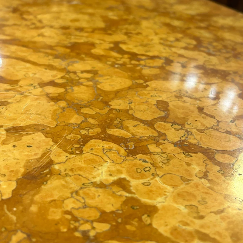 Louis XV style chest of drawers in orange-toned marble with marquetry