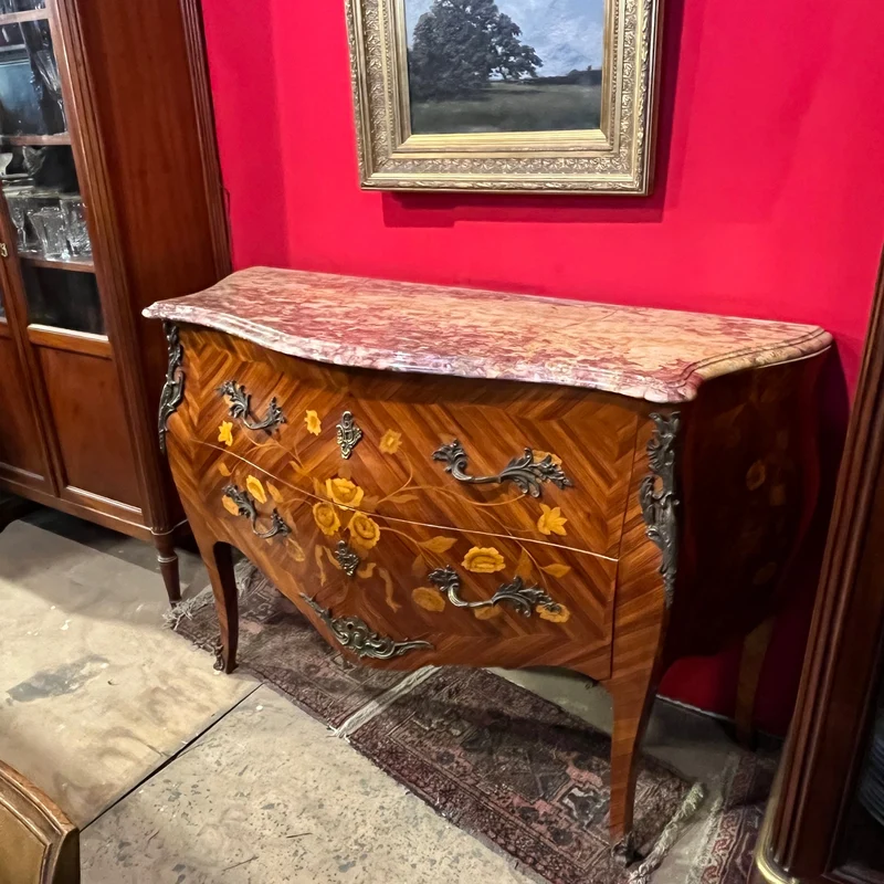 Louis XV bombé chest of drawers with floral marquetry and pink marble