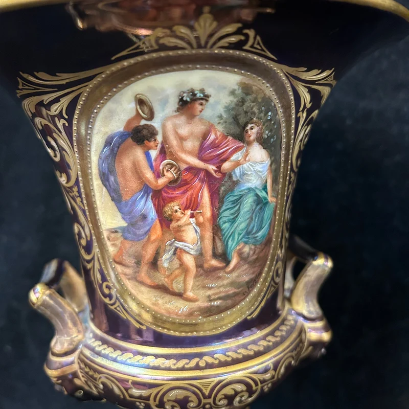 Purple Viennese porcelain urn vase with gold decorations “Bacchus and the Nymph”
