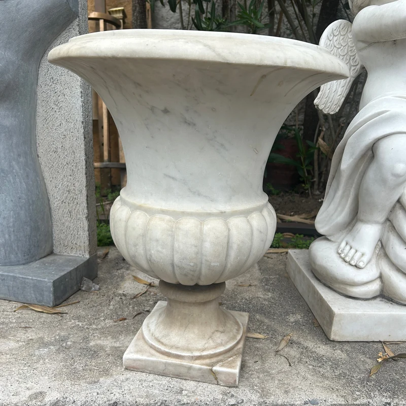 Beautiful white marble chalice carved in the Medici style