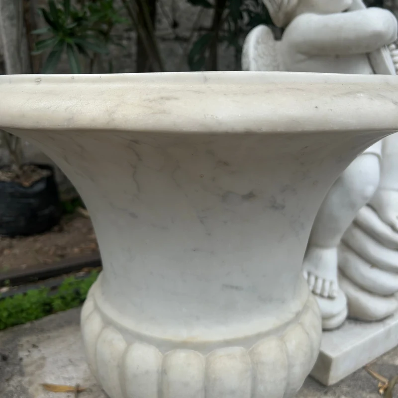 Beautiful white marble chalice carved in the Medici style