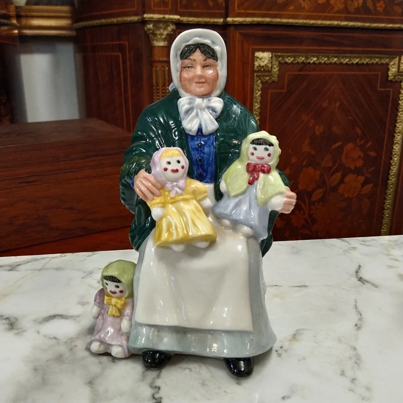 Royal Doulton porcelain figurine 'The rag doll seller' 1989