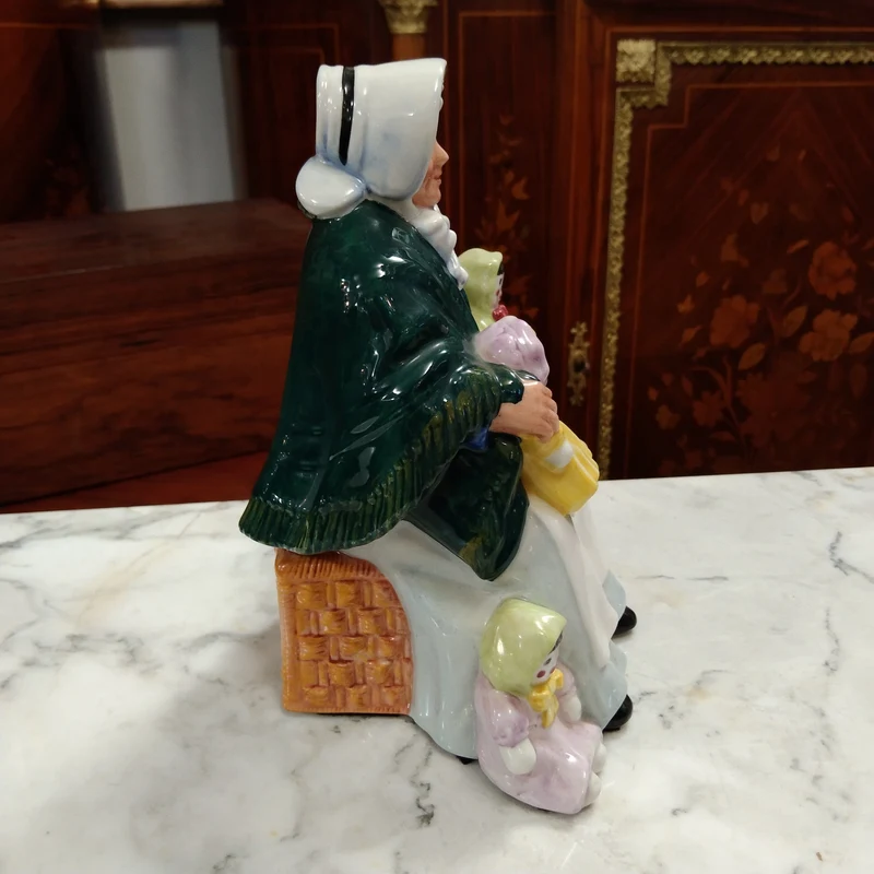 Royal Doulton porcelain figurine 'The rag doll seller' 1989