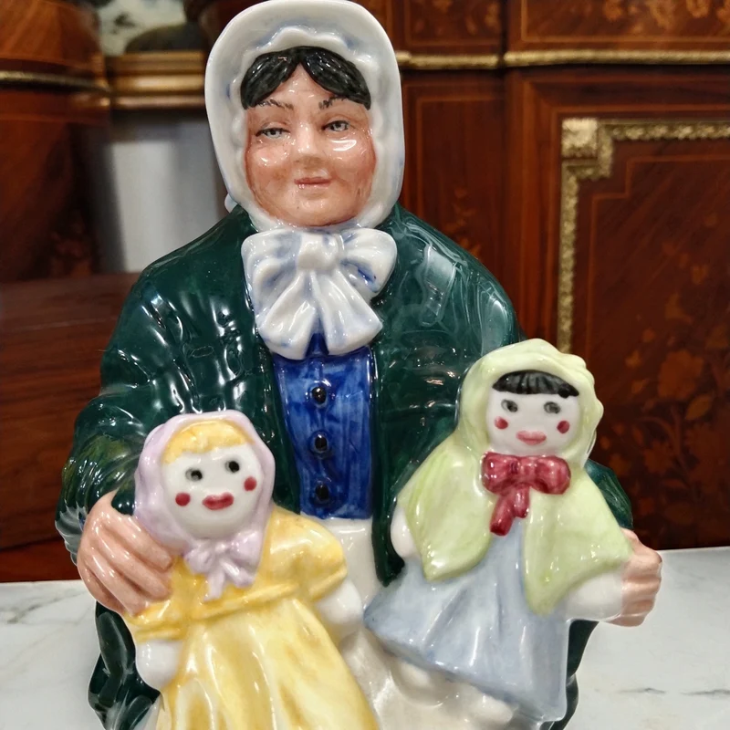Royal Doulton porcelain figurine 'The rag doll seller' 1989