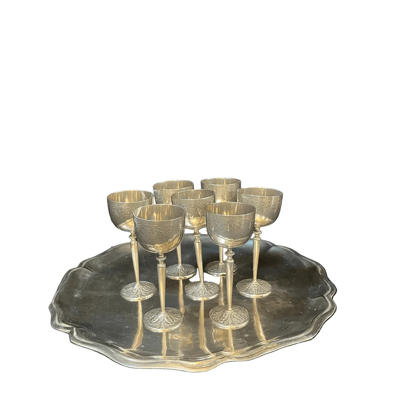 Set of 7 small glasses and tray, silver-plated with floral reliefs