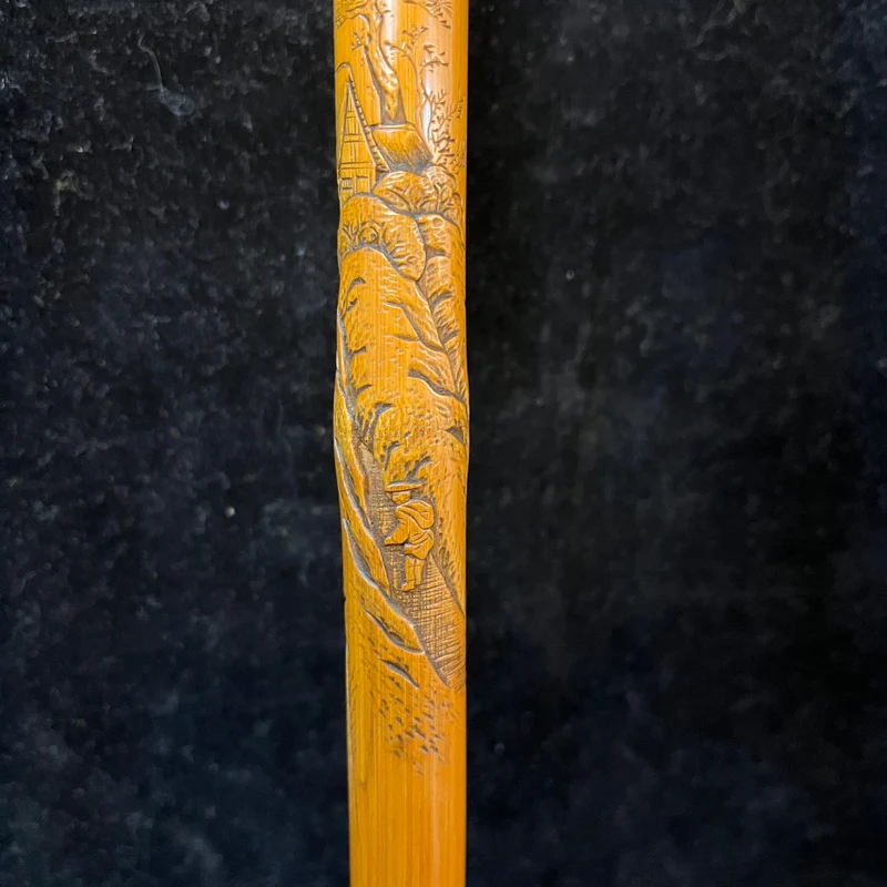 Chinese walking stick, carved wood, oriental mountain landscapes
