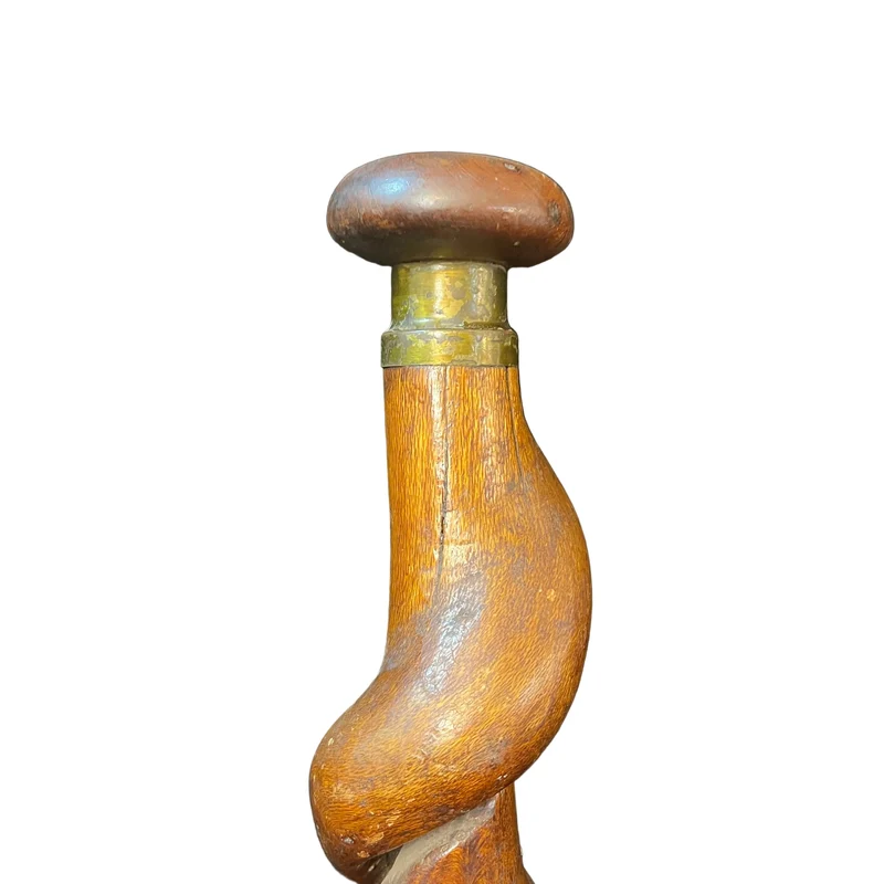 Walking stick carved in a curve, round handle and bronze