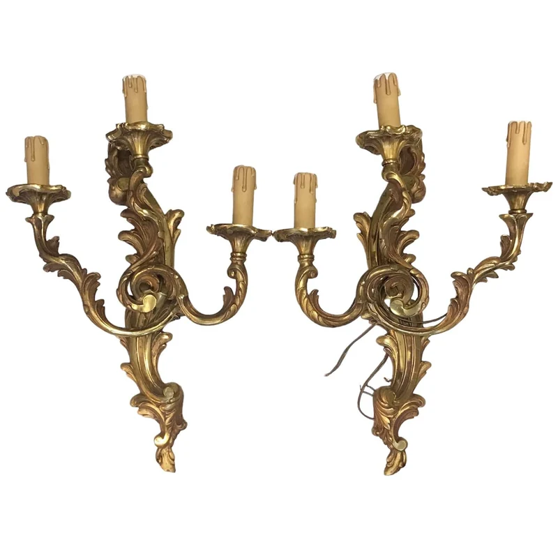 Pair of three-armed bronze wall lights