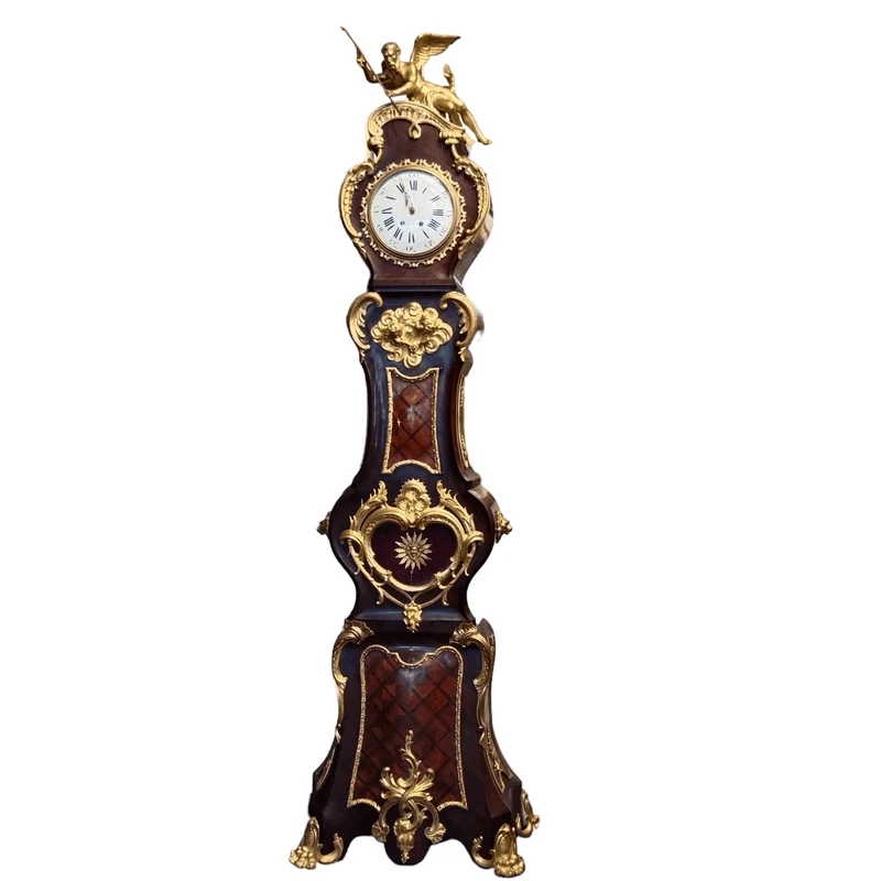 Large Louis XV Clock with magnificent bronze applications and mahogany veneer