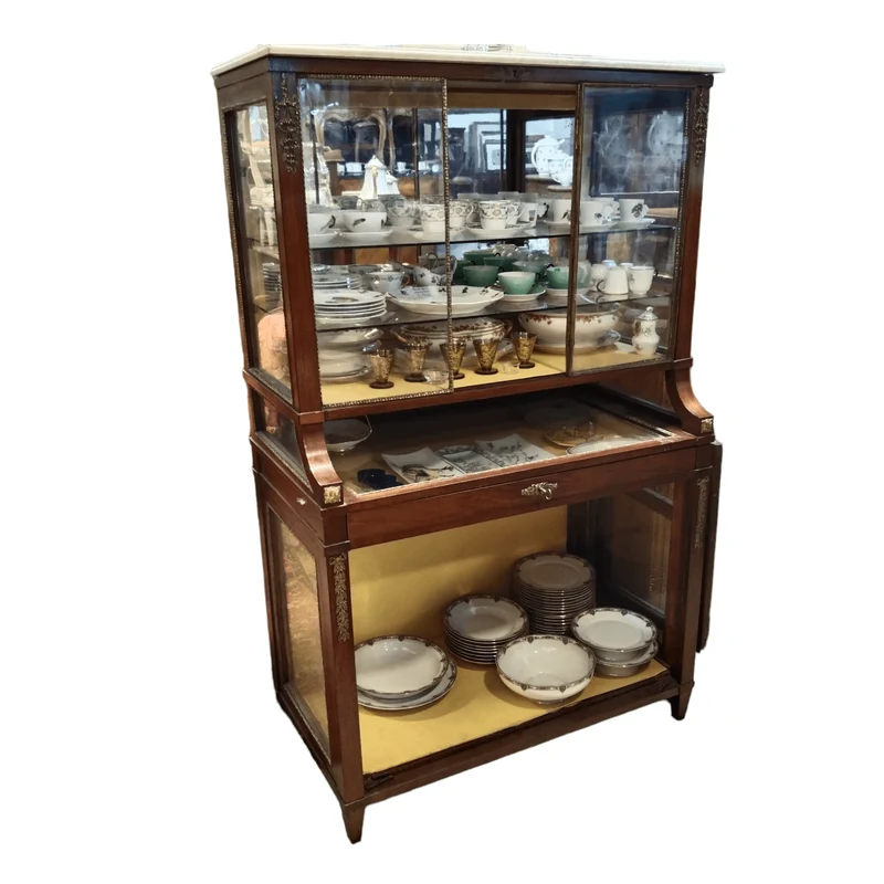 Elegant showcase with bronze applications, marble top and display drawer