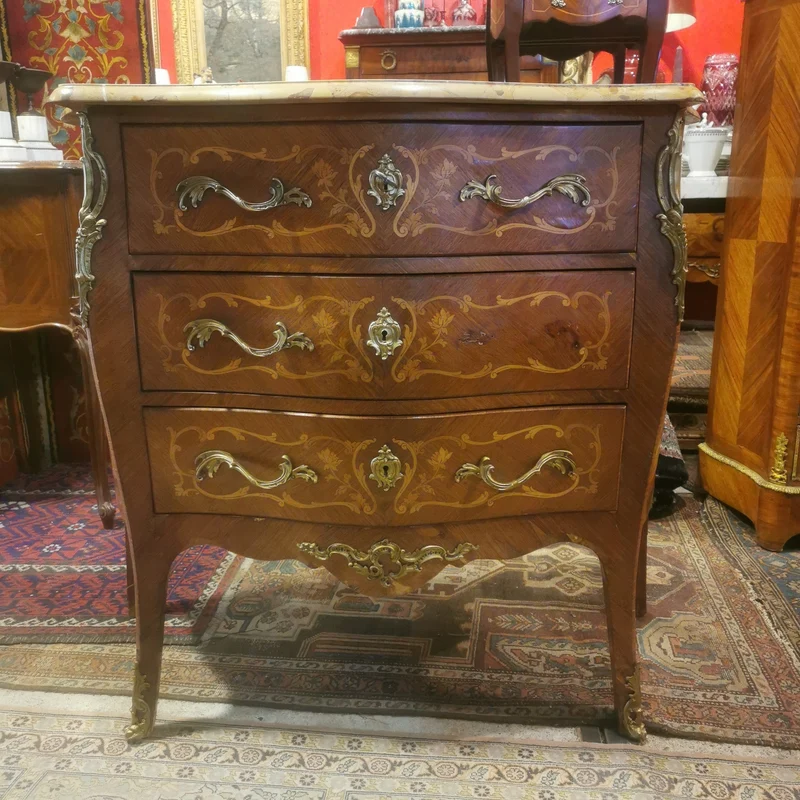 Louis XV three-drawer chest of drawers with marble marquetry