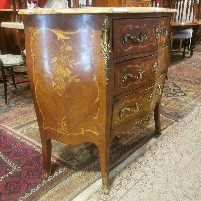 Louis XV three-drawer chest of drawers with marble marquetry